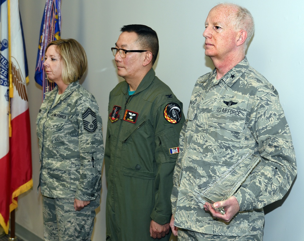 US Air Force BG Christopher Knapp gives Col. Jim Duong and CMSgt Kris Rode the 2015 ANG Medical Service Annual Award for Outstanding Achievement in Innovation.  (U.S. Air National Guard photo by Staff Sgt. Matthew T. Doyle/Released)