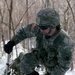 Vermont National Guard Soldier ascends a mountain