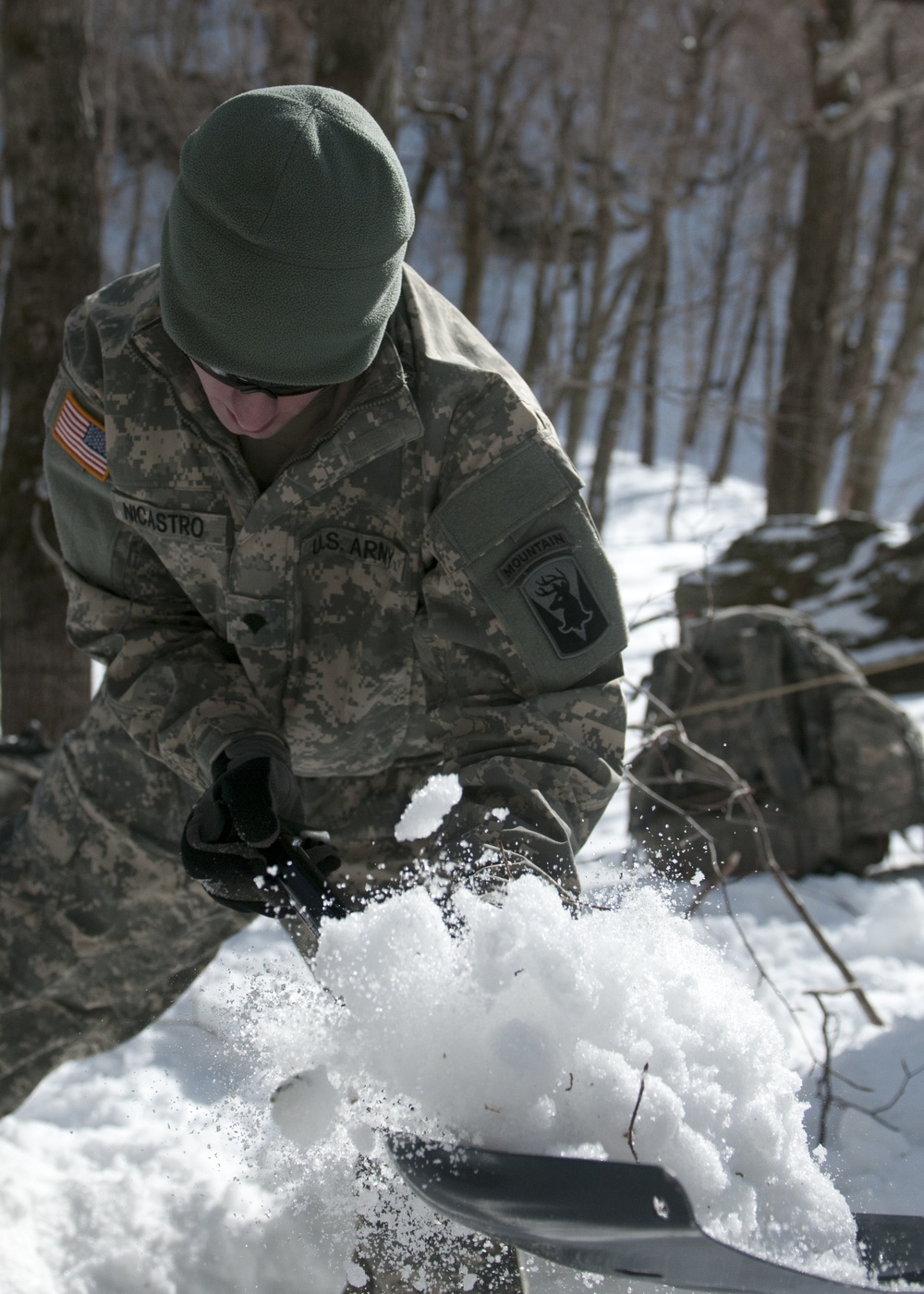 Vermont National Guard Soldier shovels snow