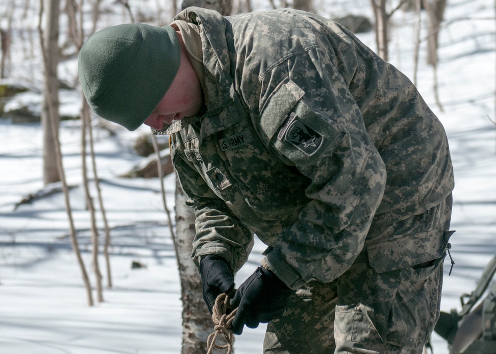 Vermont National Guard Soldier sets up tent