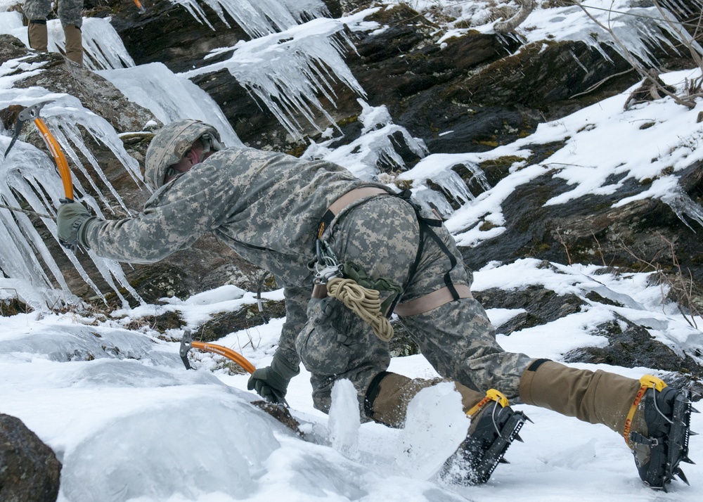 Vermont National Guard Soldier climbs an ice wall