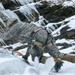 Vermont National Guard Soldier climbs an ice wall