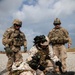 Dutch, Italian and German soldiers learn to assemble, disassemble, and operate the M240