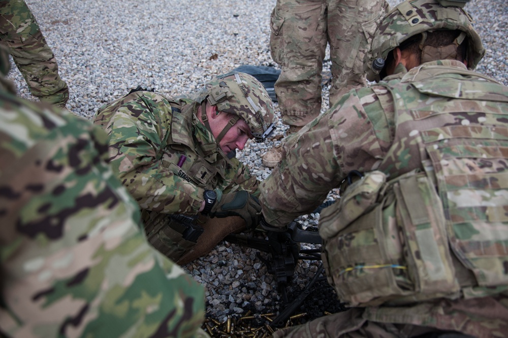 Dutch, Italian and German soldiers learn to assemble, disassemble, and operate the M240