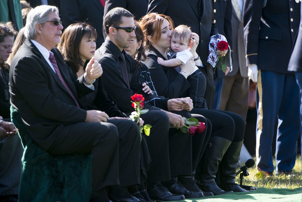 Graveside service for US Army Sgt. 1st Class Matthew Q. McClintock takes place in Section 60 of Arlington National Cemetery