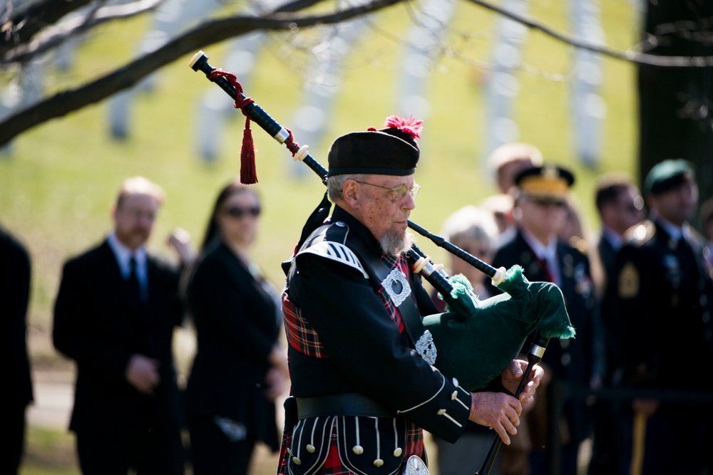 Graveside service for US Army Sgt. 1st Class Matthew Q. McClintock takes place in Section 60 of Arlington National Cemetery