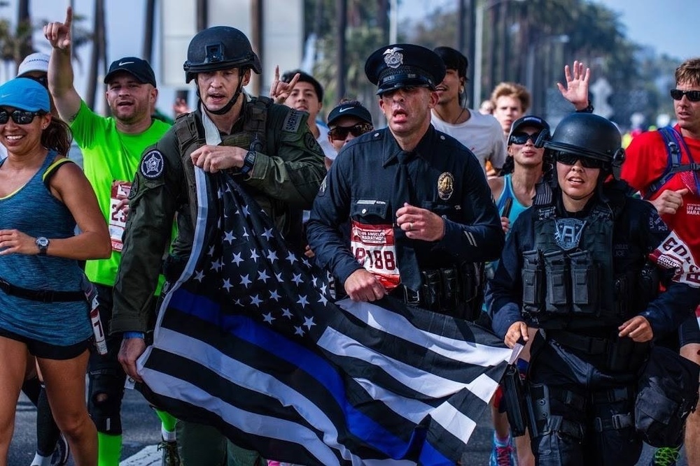LAPD, Cal Guard officer gears up for good cause: Kristina Tudor runs LA Marathon in full tactical uniform