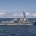 USS Chung Hoon sails near John C. Stennis Strike Group