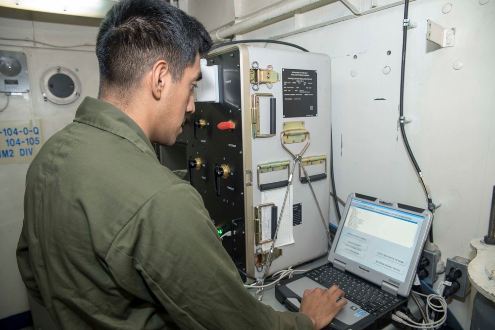 USS Bonhomme Richard sailor performs maintenance