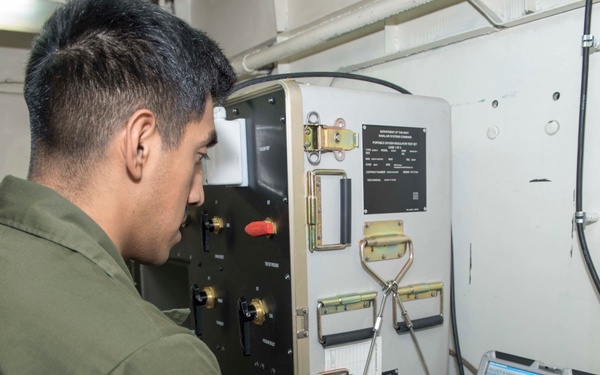 USS Bonhomme Richard sailor performs maintenance