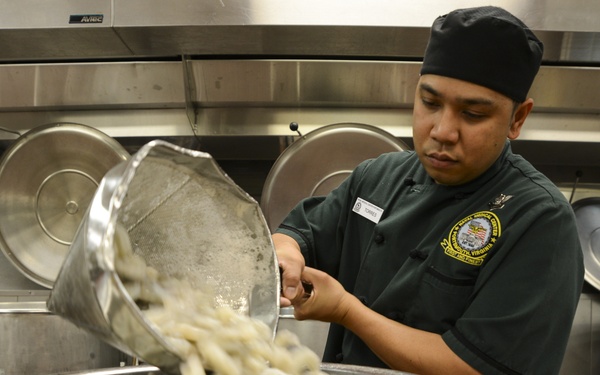 Sailor preps food