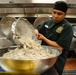 Sailor preps food