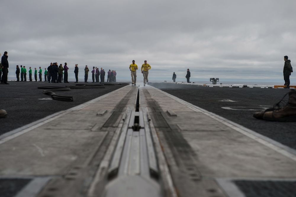 USS Theodore Roosevelt sailors prep for launch