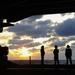 USS George Washington sailors view sunset