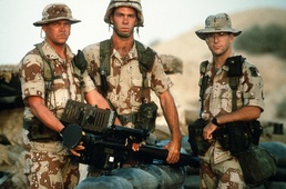 Soldiers from the 11th Air Defense Artillery pose with a Stinger missile launcher during Operation Desert Shield.