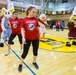 Atlantic Coast Conference mascots help greet children of fallen combat troops
