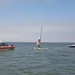 Coast Guard, Coast Guard Auxiliary rescue boater off overturned catamaran near Bolivar Galveston Jetty