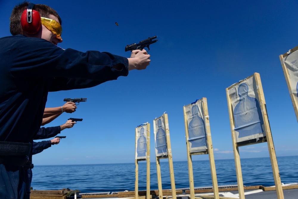 Small-arms qualification aboard USS Carney
