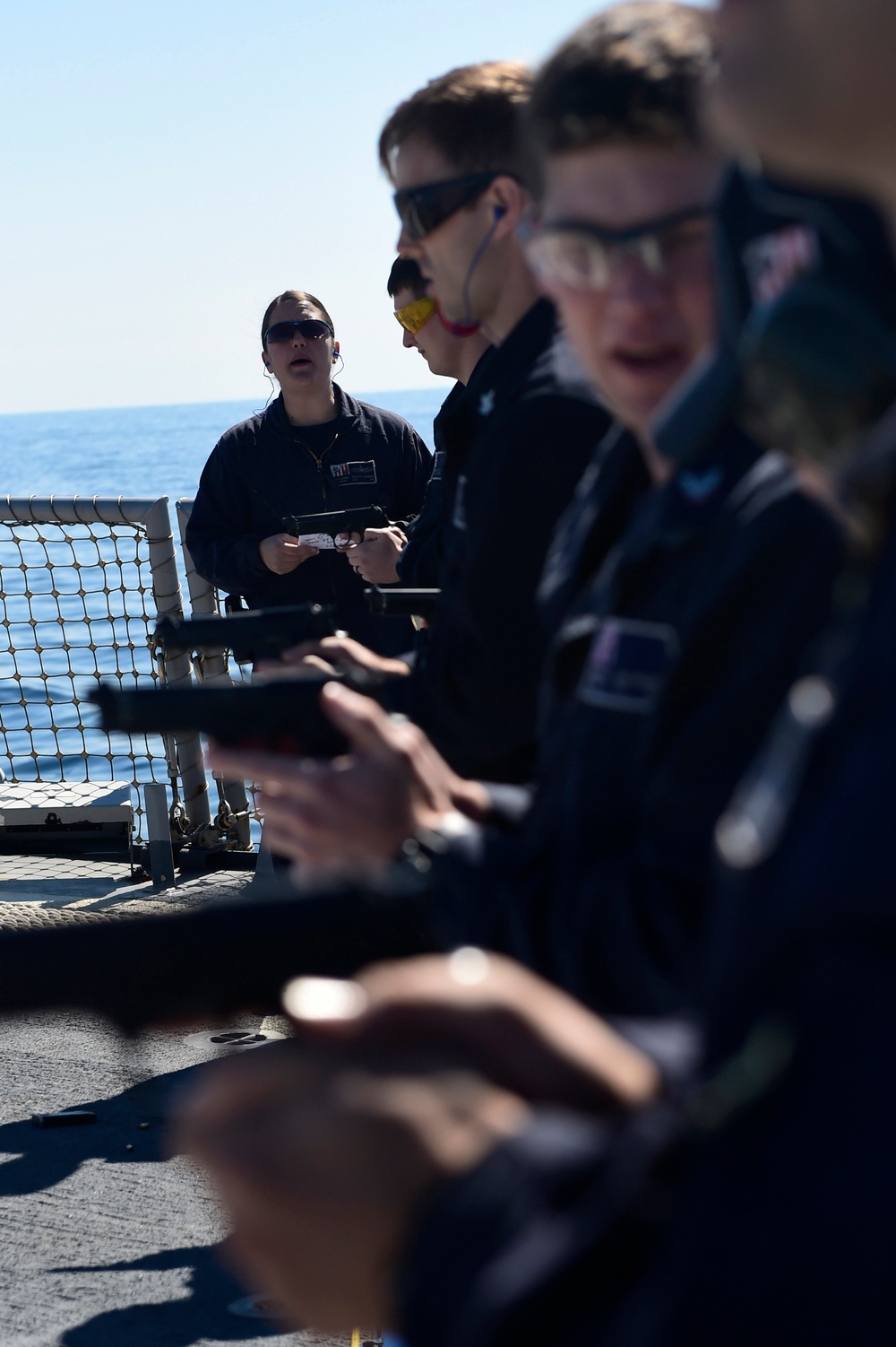 Small-arms qualification aboard USS Carney