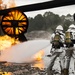 Reserve firefighters dose flames to complete annual training