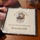 The image shows a CD case on a wooden surface containing a 'Rural Clergy Training Program' Resource CD. The CD cover features an illustration of a soldier and the text 'Not all war wounds are visible...' along with 'Training Guide and Toolkits' and 'Resource CD'. The item appears to be a training material designed to help rural clergy support military veterans dealing with invisible wounds such as PTSD.