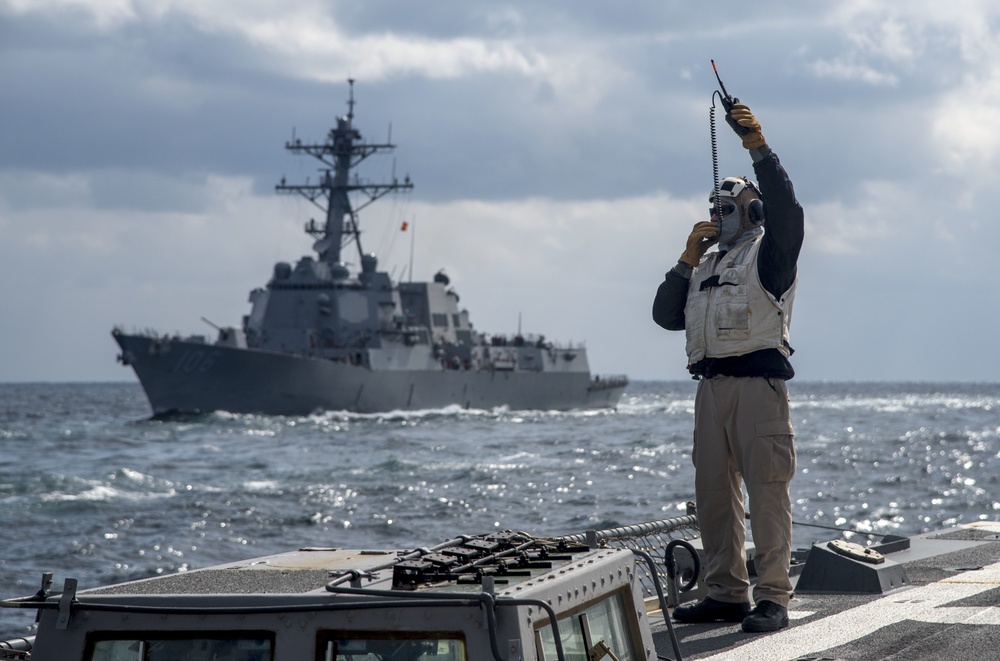 USS Chung-Hoon steams alongside USS Stockdale