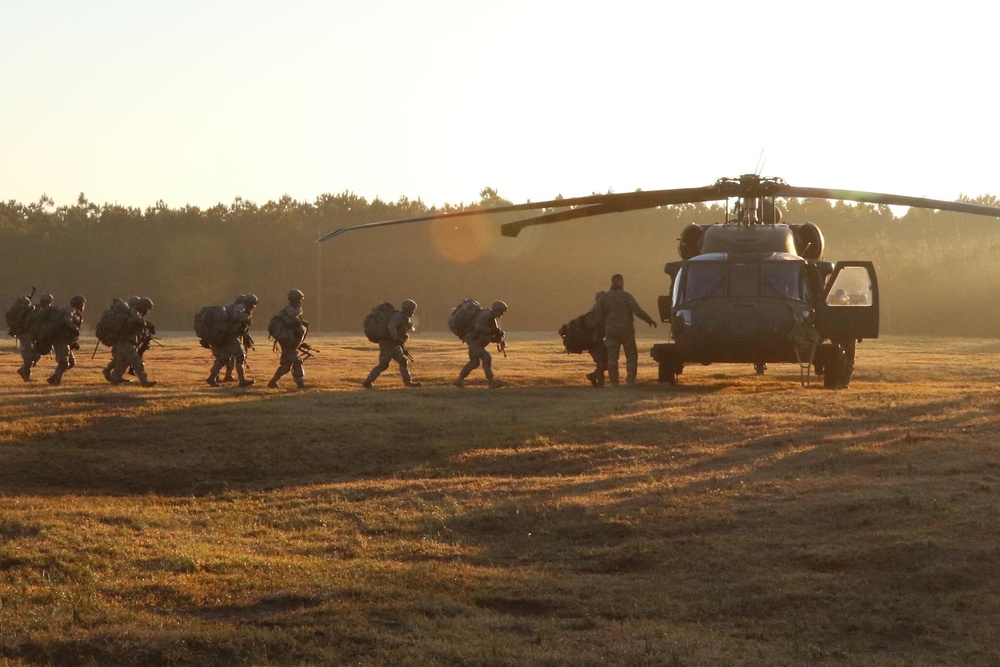 Paratroopers board Black Hawks for air assault