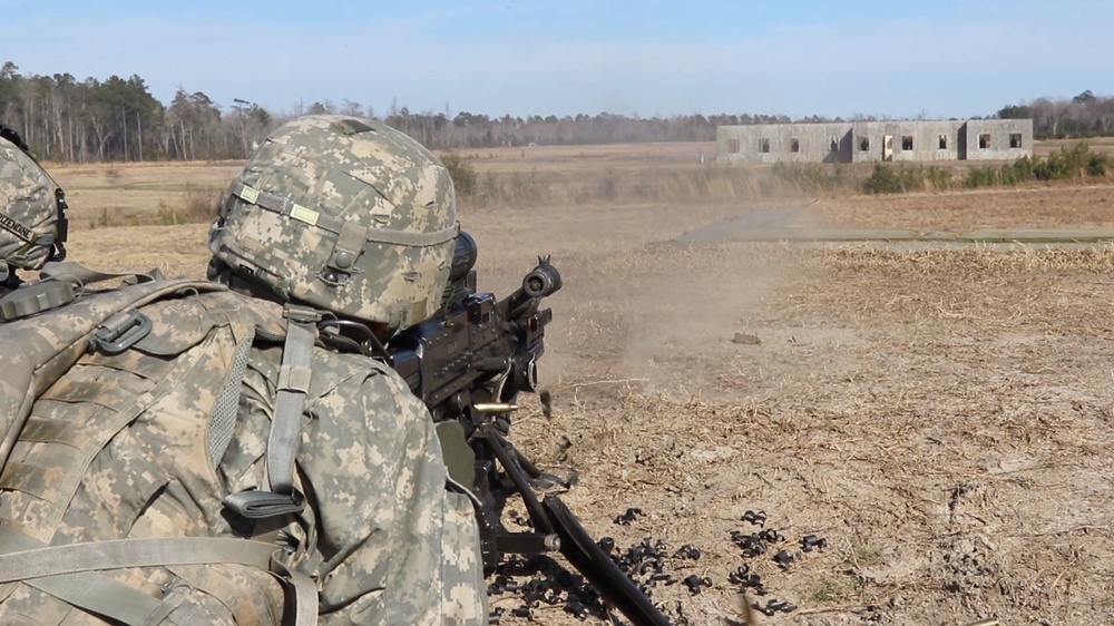 Paratrooper decimates building with machine gun during exercise