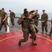 Marines practice martial arts techniques aboard USS Oak Hill