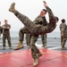 Marines practice martial arts techniques aboard USS Oak Hill