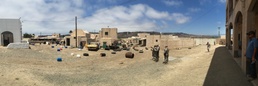 Soldiers from the 416th CA Bn. (Abn). conduct and area assessment of the damage to the simulated Philipipine city