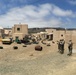 Soldiers from the 416th CA Bn. (Abn). conduct and area assessment of the damage to the simulated Philipipine city