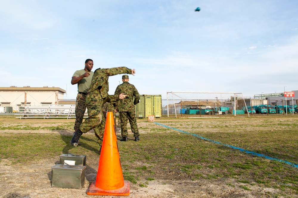 Japanese service members enhance English skills with Marines