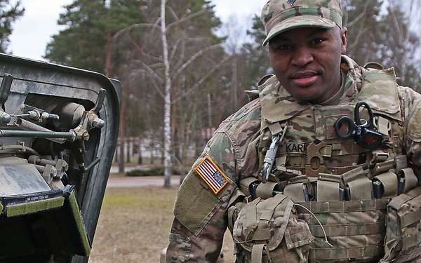 Soldiers present static display for Latvian youth