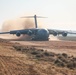 C-17 lands onto dirt strip