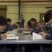 USS Frank Cable sailor takes exam