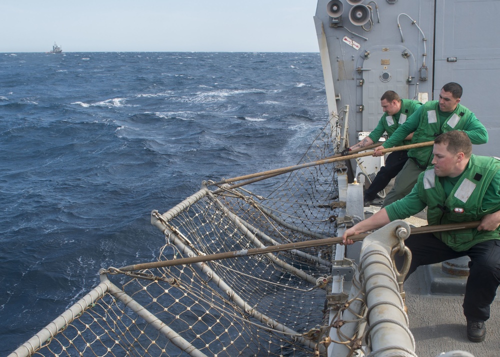 USS Roosevelt (DDG 80) raise safety nets