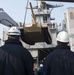 M1A1 tank on load to USS Ashland