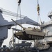 M1A1 tank on load to USS Ashland