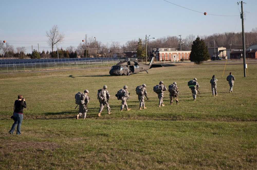 U.S Army Soldiers make movement to aircraft