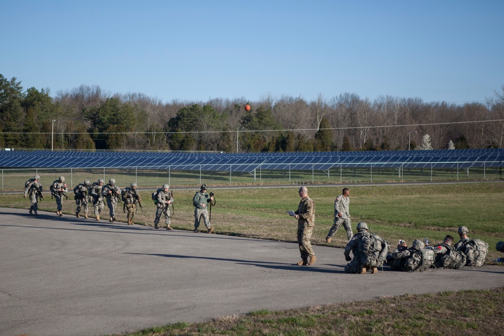 Best Warrior Competition competitors ruck to next point