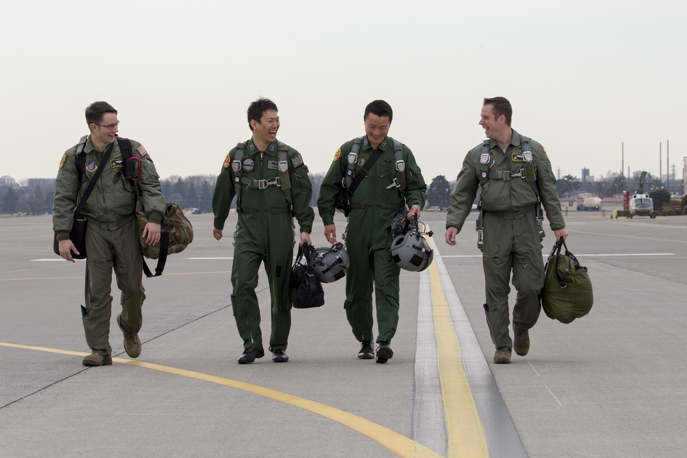 NCO exhange: JASDF Airmen fly with Hercules