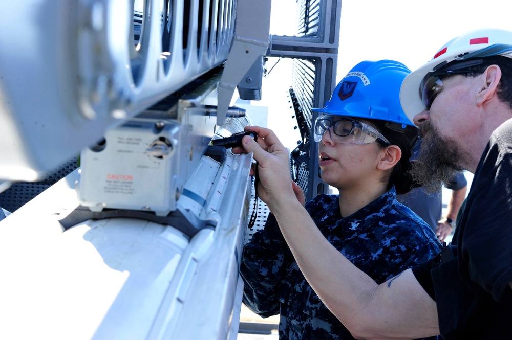 CVN 78 Combat Systems Sailors Load NATO Sea Sparrow missiles