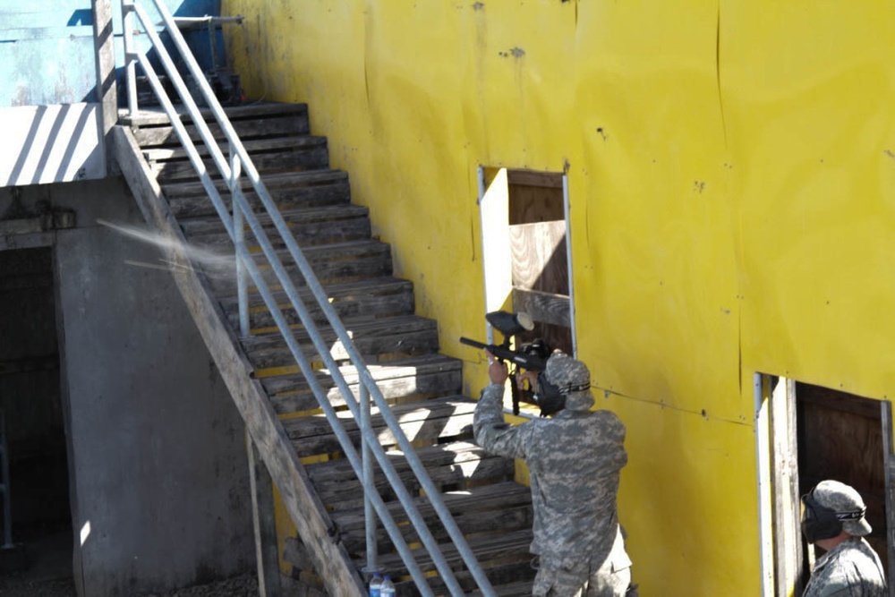 Soldier moves through an Urban Assault Course