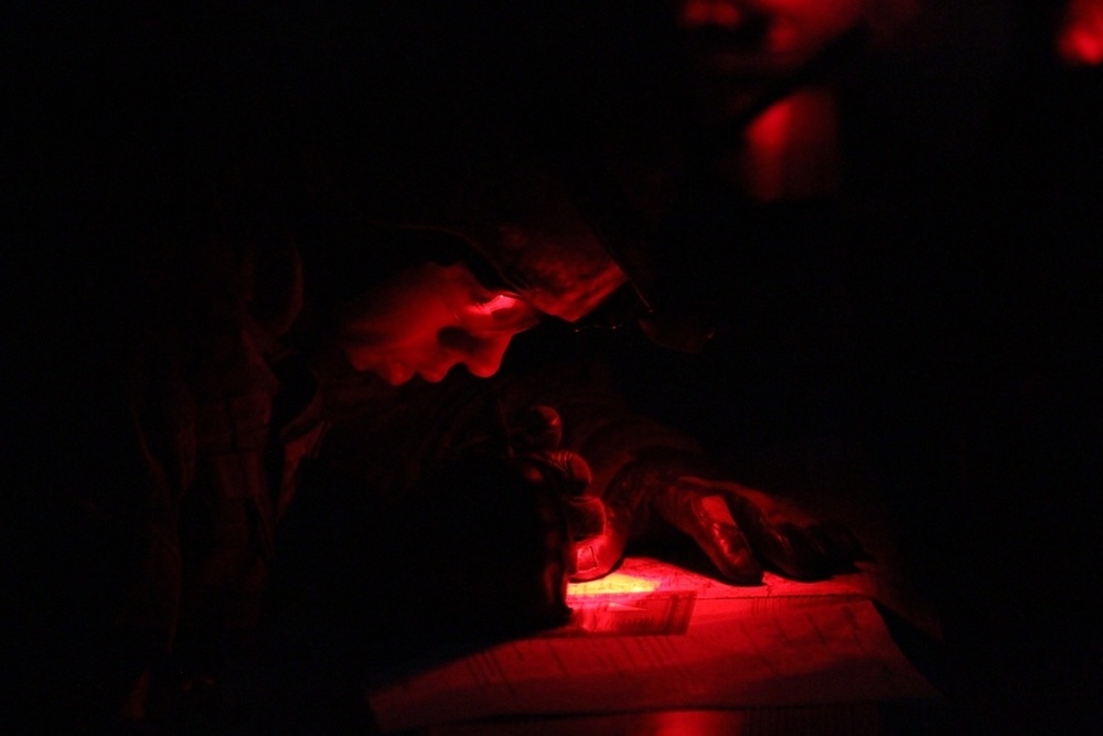 Soldier plots points during land navigation