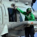 Mason Sailor Performs After-Flight Checks on Helicopter