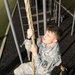 ROTC cadet climing rope