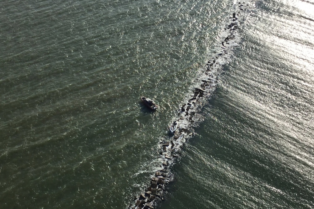 Coast Guard saves 2 from boat aground on Galveston South Jetty
