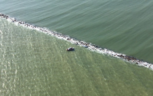 Coast Guard saves 2 from boat aground on Galveston South Jetty