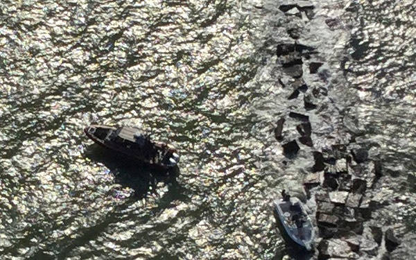 Coast Guard saves 2 from boat aground on Galveston South Jetty